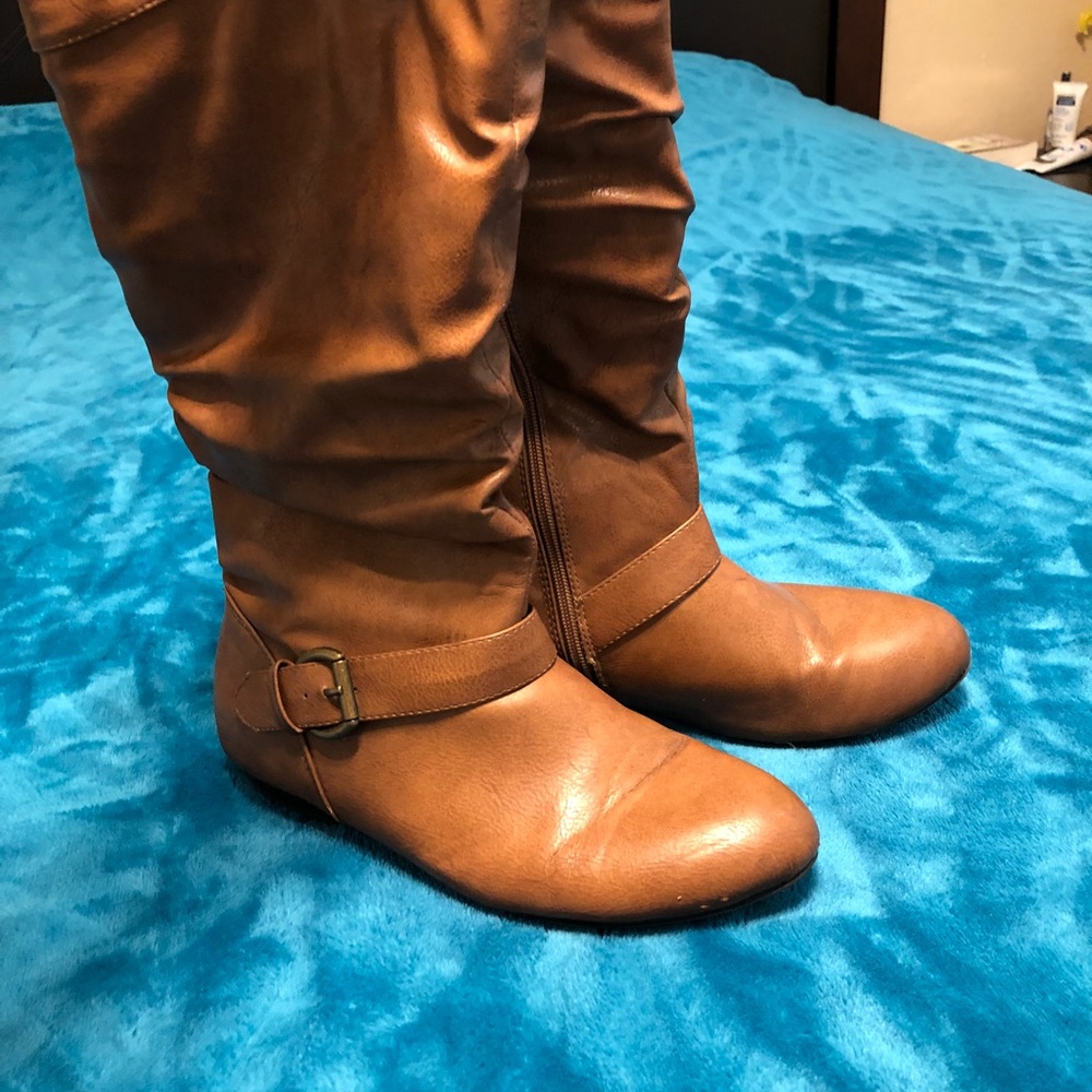 Tan, tall boots.